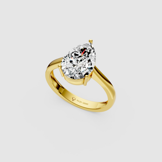 Essence – 18K Solid Gold Pear Moissanite Minimalist Statement Ring