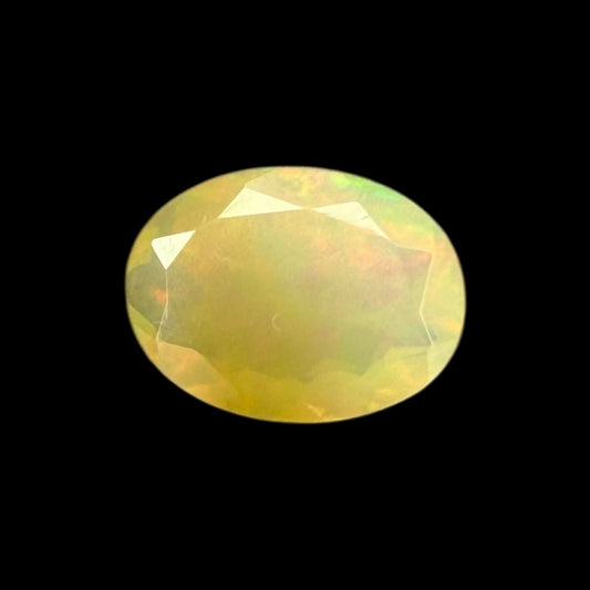 Natural LightYellow Ethiopian Opal Stone 0.78 Carats Oval Cabochon Shape 8.1 x 6 mm