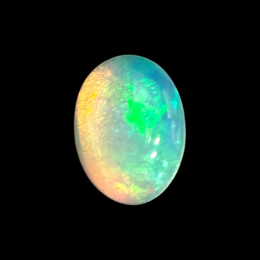 Natural White Ethiopian Opal Stone 0.4.1 Carats Oval Cabochon Shape 6.9 x 5 mm