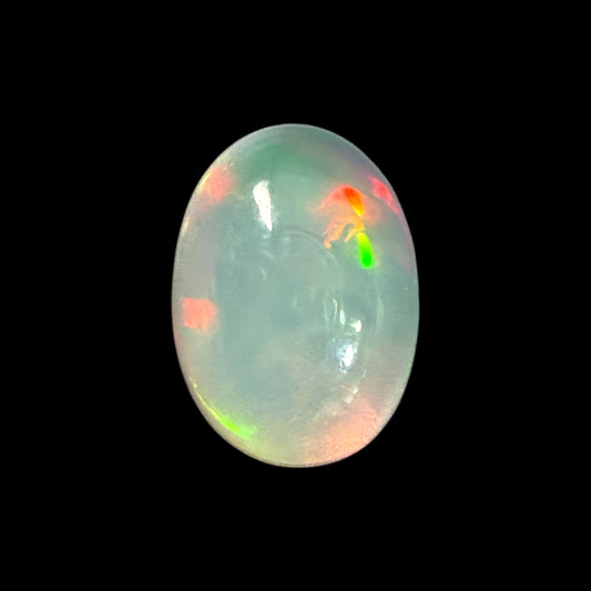 Natural White Ethiopian Opal Stone 0.63 Carats Oval Cabochon Shape 7.2 x 6.1 mm