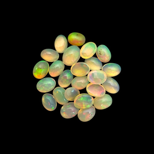 Natural White Ethiopian Opal Stone 14.79 Carats Oval Cabochon Shape 7 x 5 mm