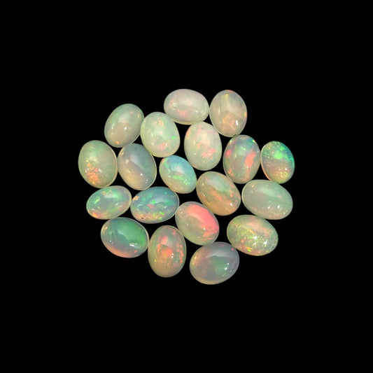Natural White Ethiopian Opal Stone 15.75 Carats Oval Cabochon Shape 8 x 6 mm
