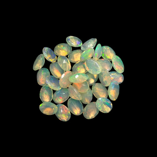Natural White Ethiopian Opal Stone 17.15 Carats Oval Cabochon Shape 7 x 5 mm