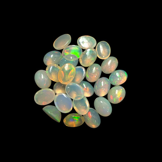 Natural White Ethiopian Opal Stone 23.85 Carats Oval Cabochon Shape 8 x 6 mm