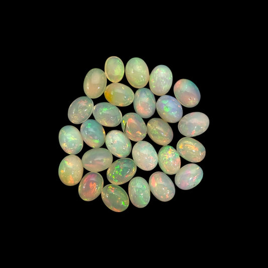 Natural White Ethiopian Opal Stone 24.92 Carats Oval Cabochon Shape 8 x 6 mm