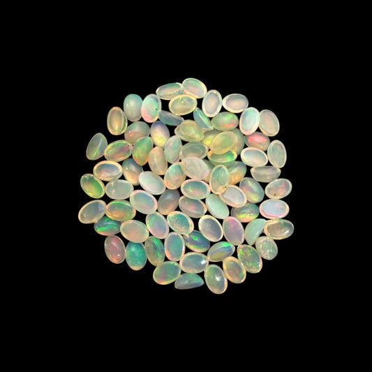 Natural White Ethiopian Opal Stone 25.91 Carats Oval Cabochon Shape 6 x 4 mm