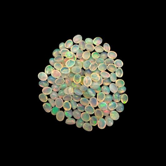 Natural White Ethiopian Opal Stone 27.63 Carats Oval Cabochon Shape 5 x 4 mm