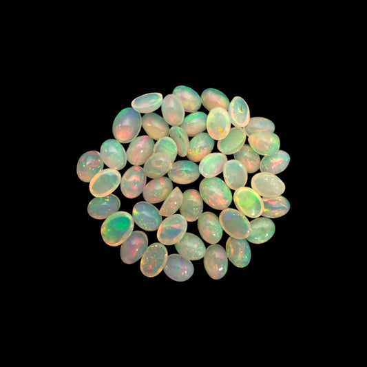 Natural White Ethiopian Opal Stone 30.18 Carats Oval Cabochon Shape 7 x 5 mm