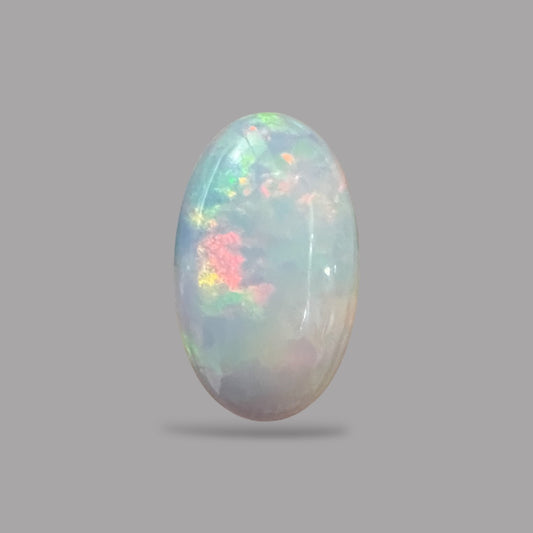 Natural White Ethiopian Opal Stone 9.98 Carats Oval Cabochon Shape 21.5 x 12.8 x 6.7 mm