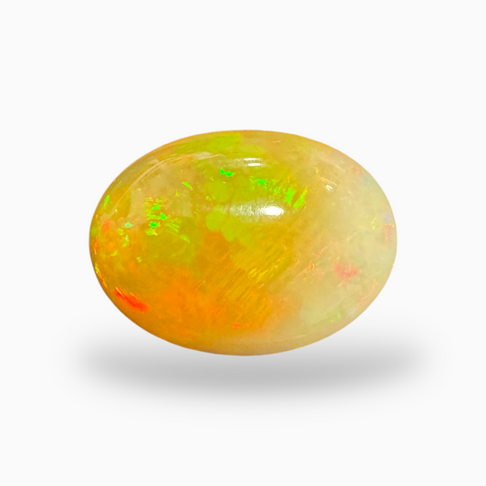 Natural Whitish Yellow Ethiopian Opal Stone 15.55 Carats Oval Cabochon Shape 13X17mm