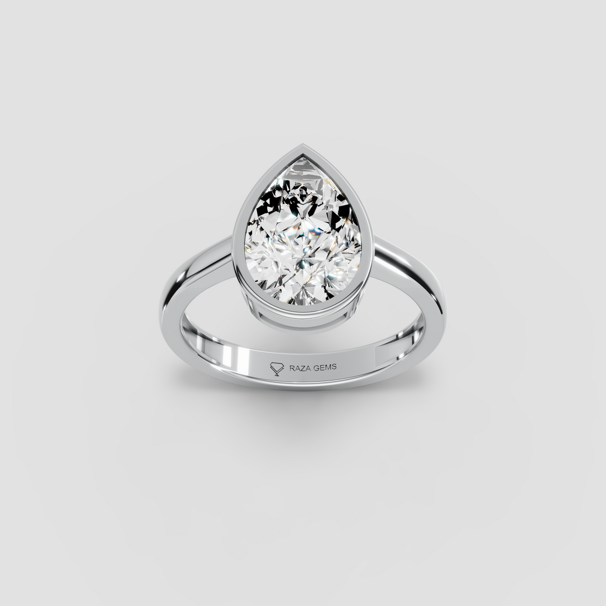 Aura – 18K Gold Pear-Cut Moissanite Bezel Solitaire Ring
