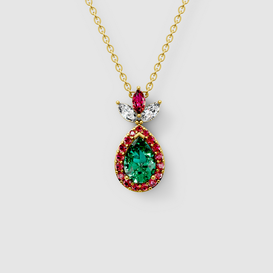 Linda - 18K Gold Pear Emerald Pendant with Ruby Halo & Moissanite Crown"