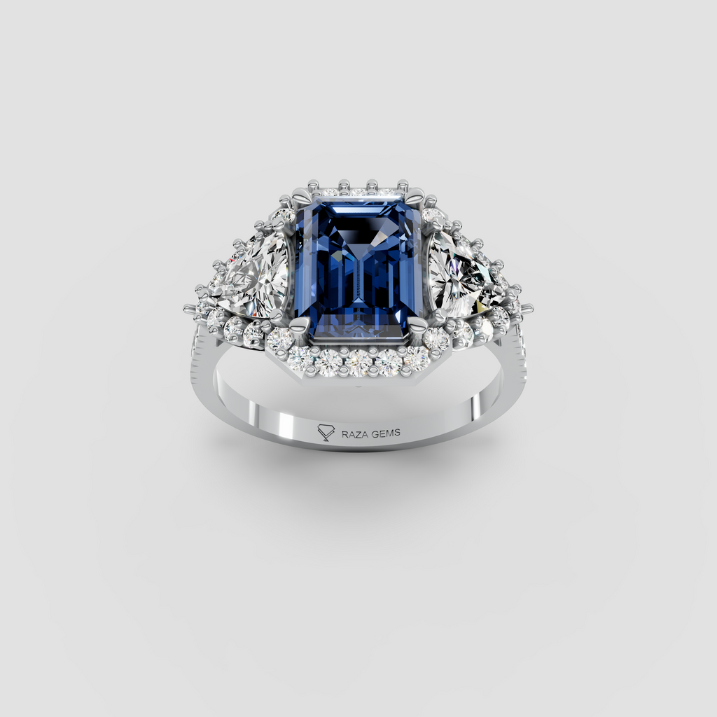Millie – Emerald Cut Blue Sapphire & Moissanite Halo Statement Ring in 18KT Gold
