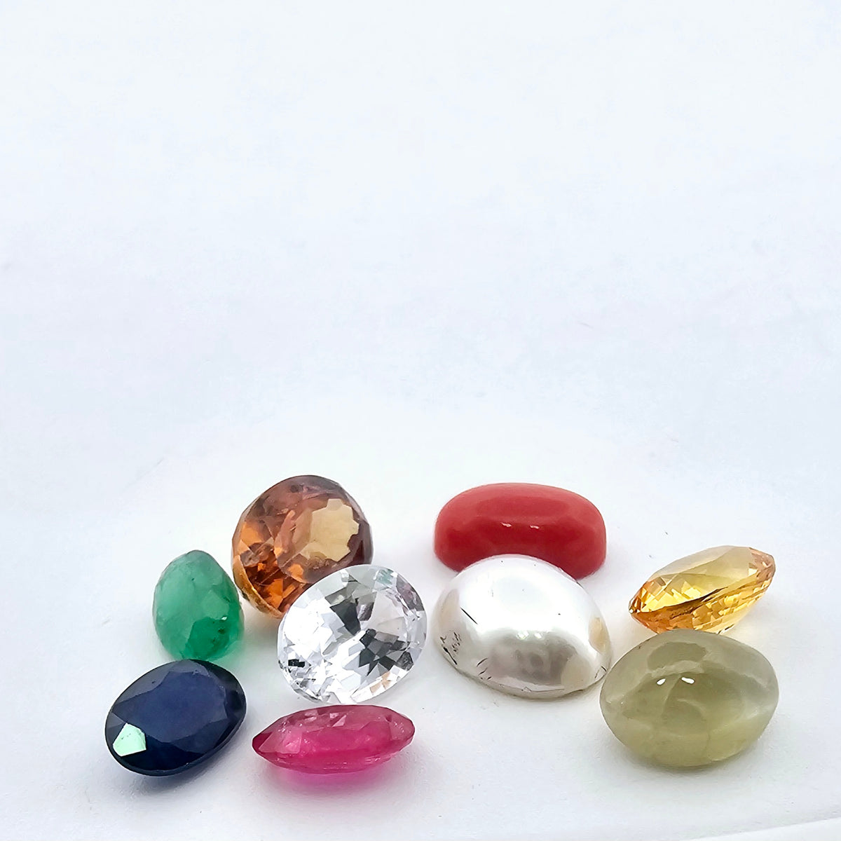Natural Navratna Set Stones in Oval Shape from Multi Origins in 1 Carats Size