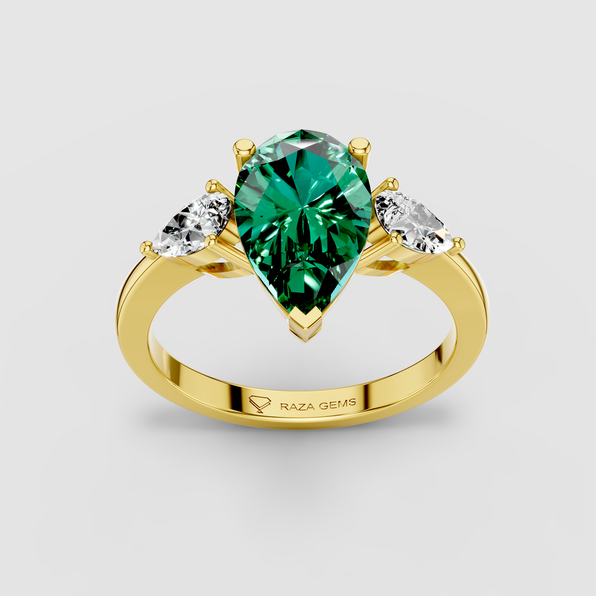 Sophia - Solid 18K Gold Pear Emerald with Pear Moissanite Side Stones