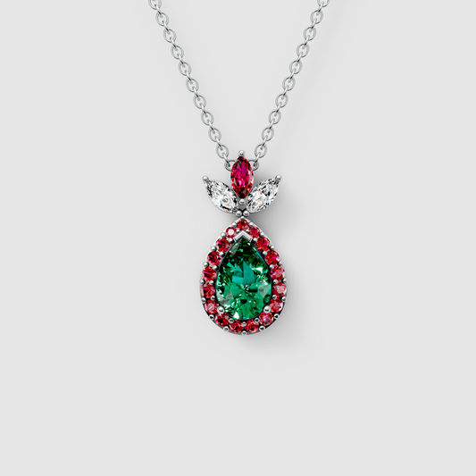 Linda - 18K Gold Pear Emerald Pendant with Ruby Halo & Moissanite Crown"