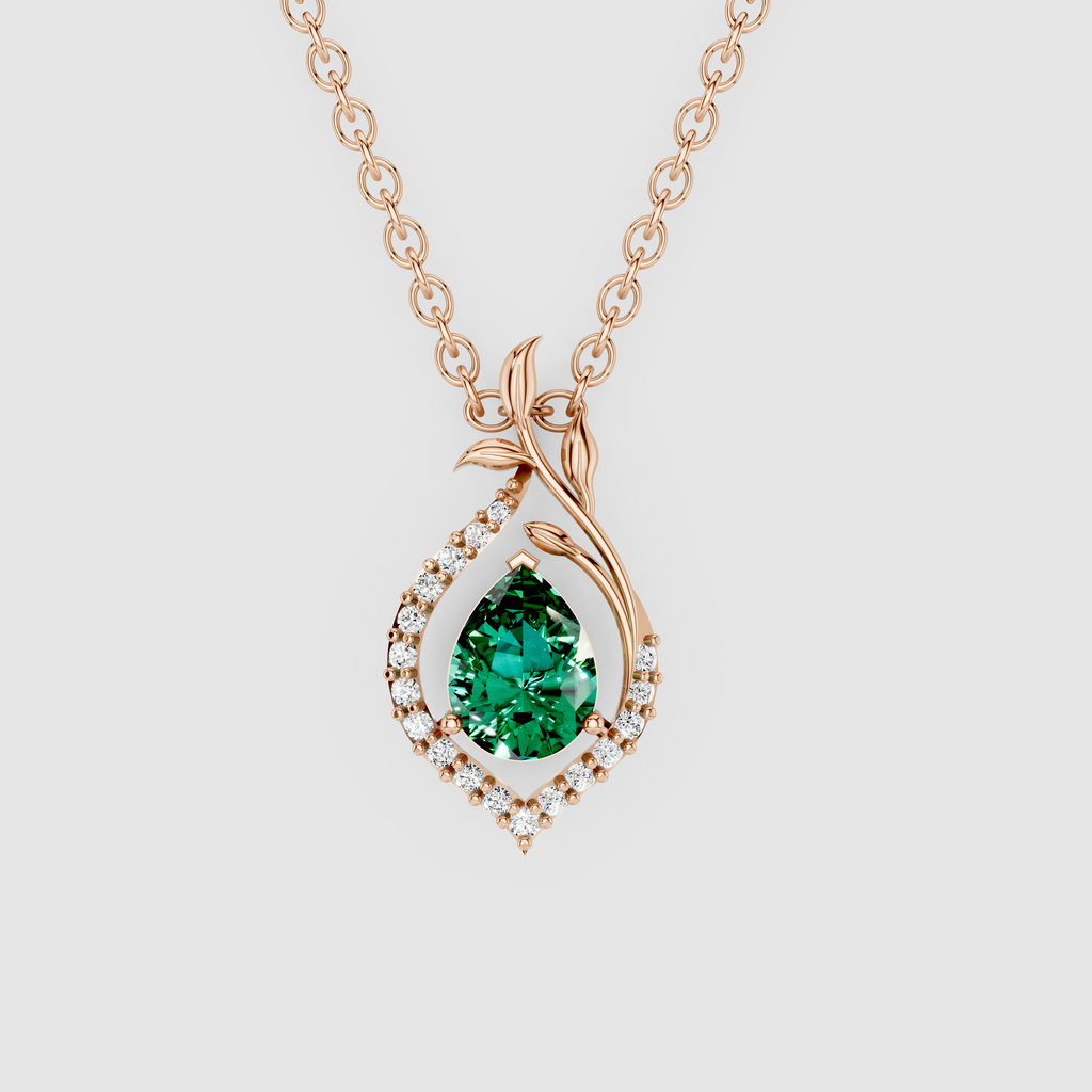 Anastasia – Pear Cut Emerald Nature-Inspired Leaf Pendant in 18KT Gold