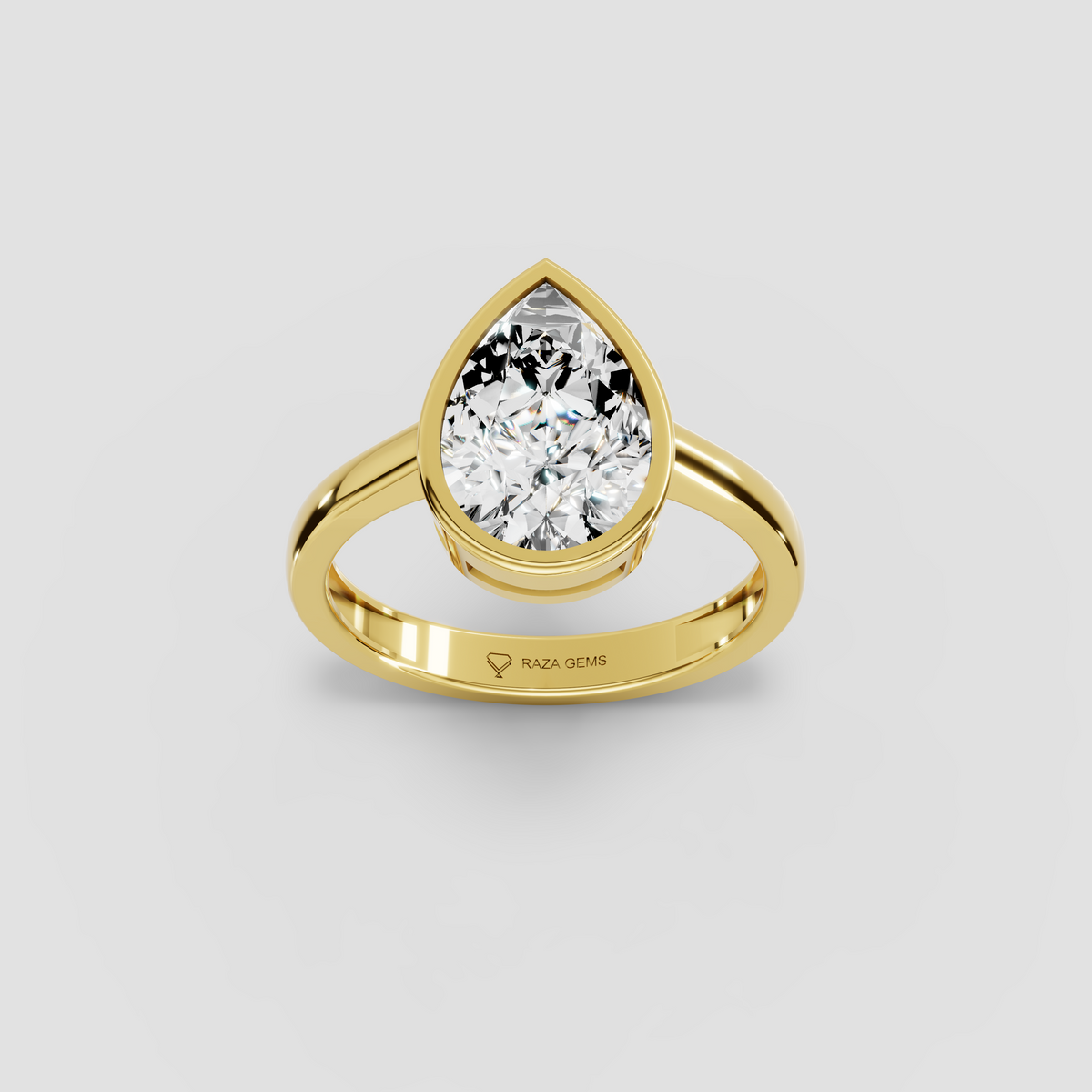 Aura – 18K Gold Pear-Cut Moissanite Bezel Solitaire Ring