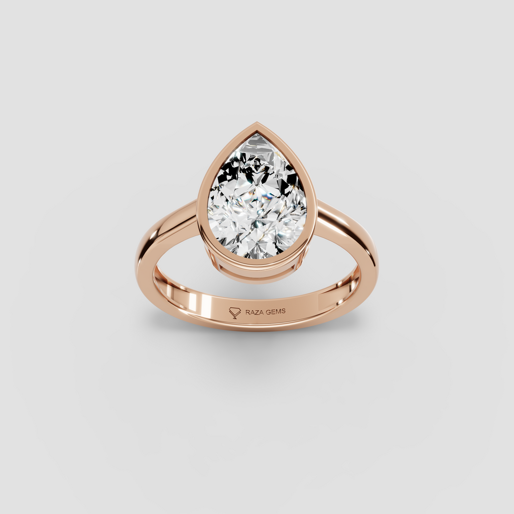 Aura – 18K Gold Pear-Cut Moissanite Bezel Solitaire Ring