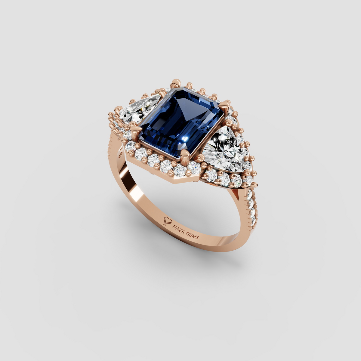 Millie – Emerald Cut Blue Sapphire & Moissanite Halo Statement Ring in 18KT Gold