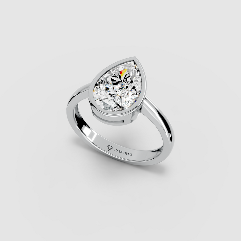 Aura – 18K Gold Pear-Cut Moissanite Bezel Solitaire Ring
