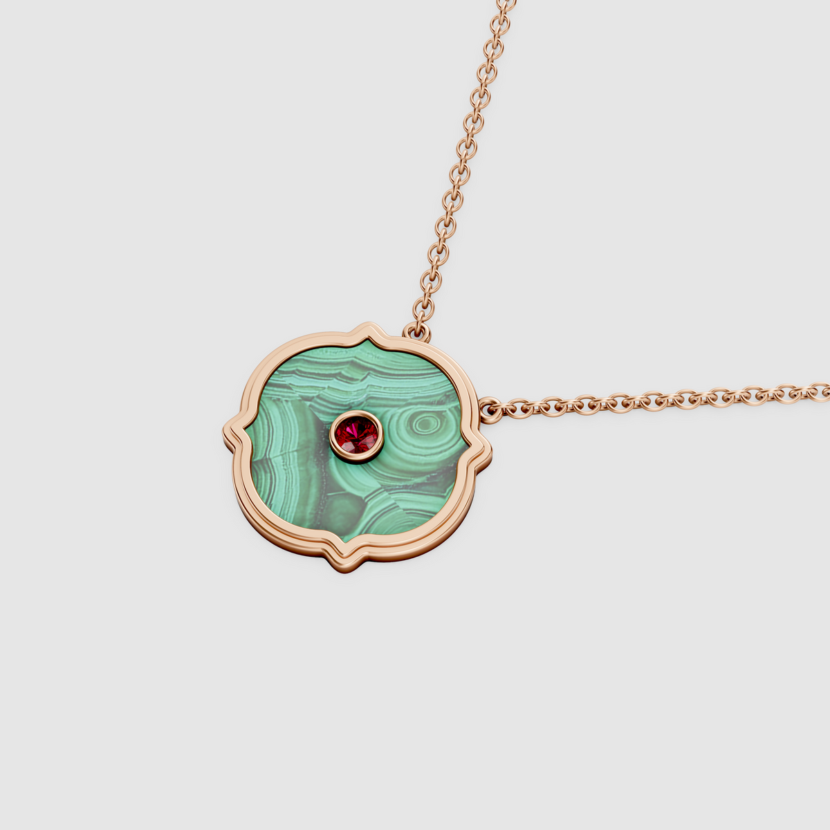 Sophia – 18K Gold Scalloped Malachite Medallion Pendant with Ruby Center Stone