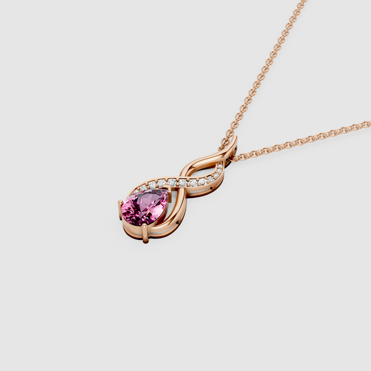 Serenity – Pear-Cut Pink Sapphire Swirl Pendant with Moissanite in 18KT Gold