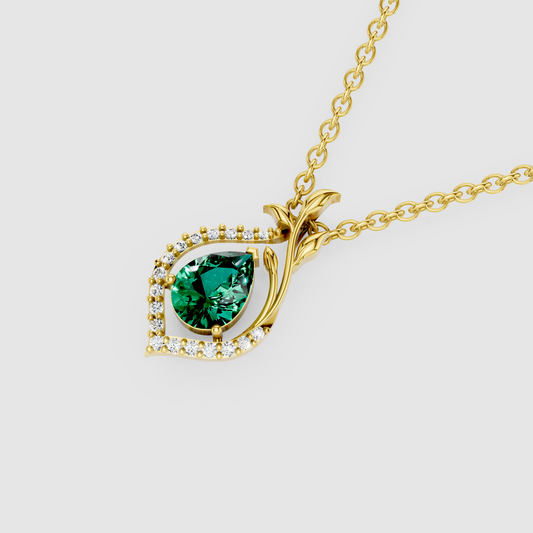 Anastasia – Pear Cut Emerald Nature-Inspired Leaf Pendant in 18KT Gold