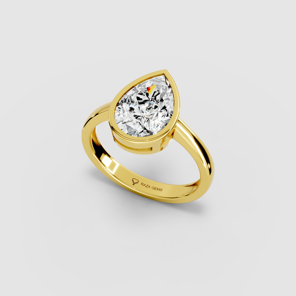 Aura – 18K Gold Pear-Cut Moissanite Bezel Solitaire Ring