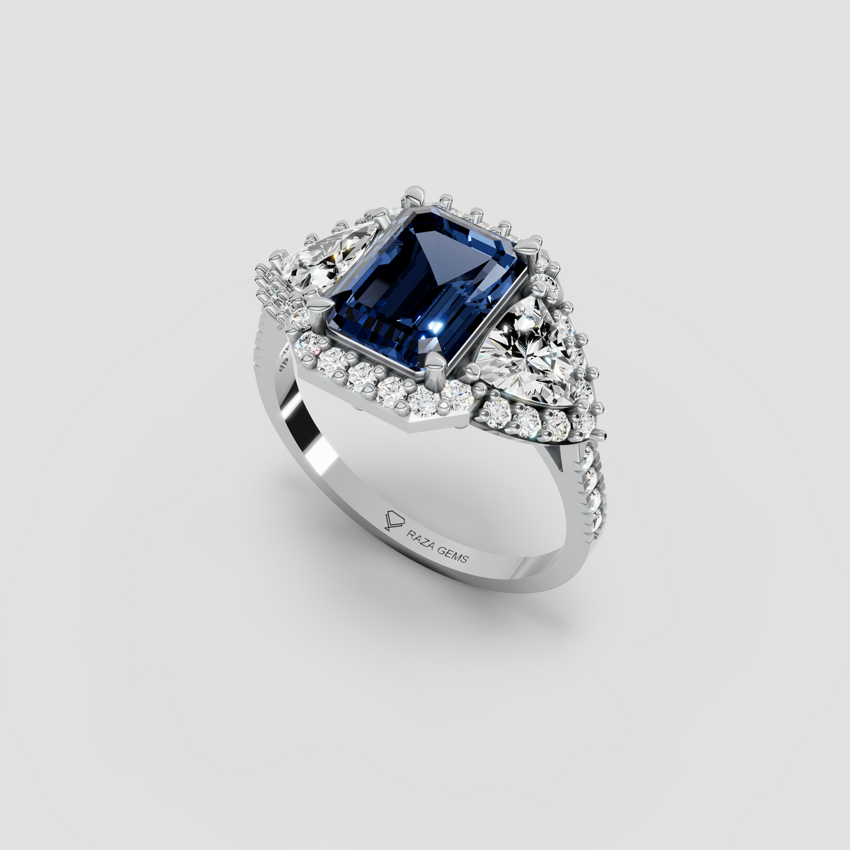 Millie – Emerald Cut Blue Sapphire & Moissanite Halo Statement Ring in 18KT Gold