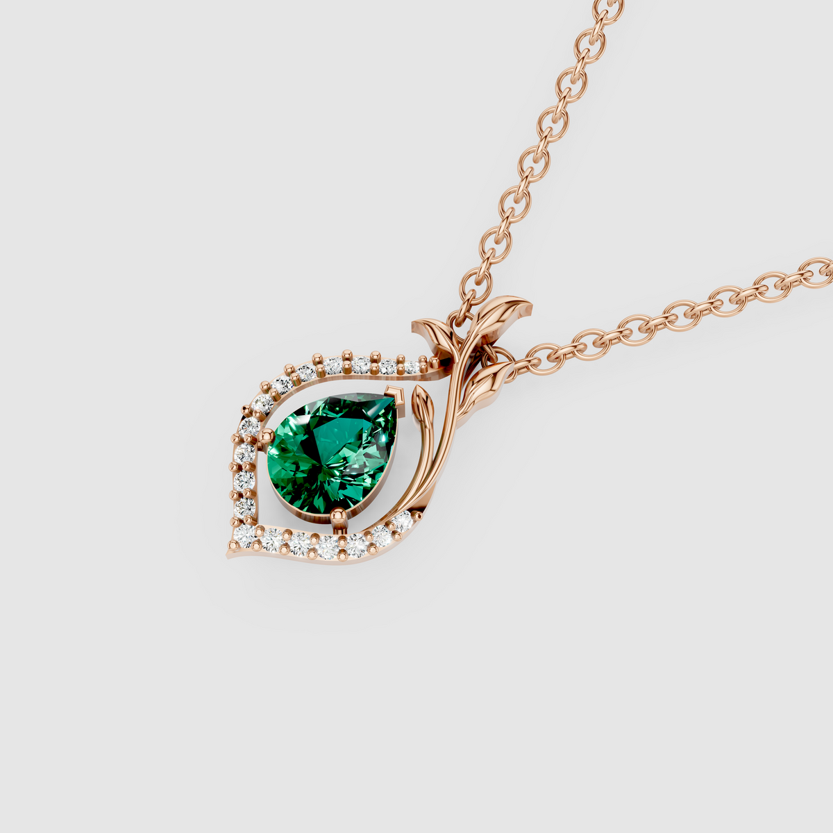 Anastasia – Pear Cut Emerald Nature-Inspired Leaf Pendant in 18KT Gold