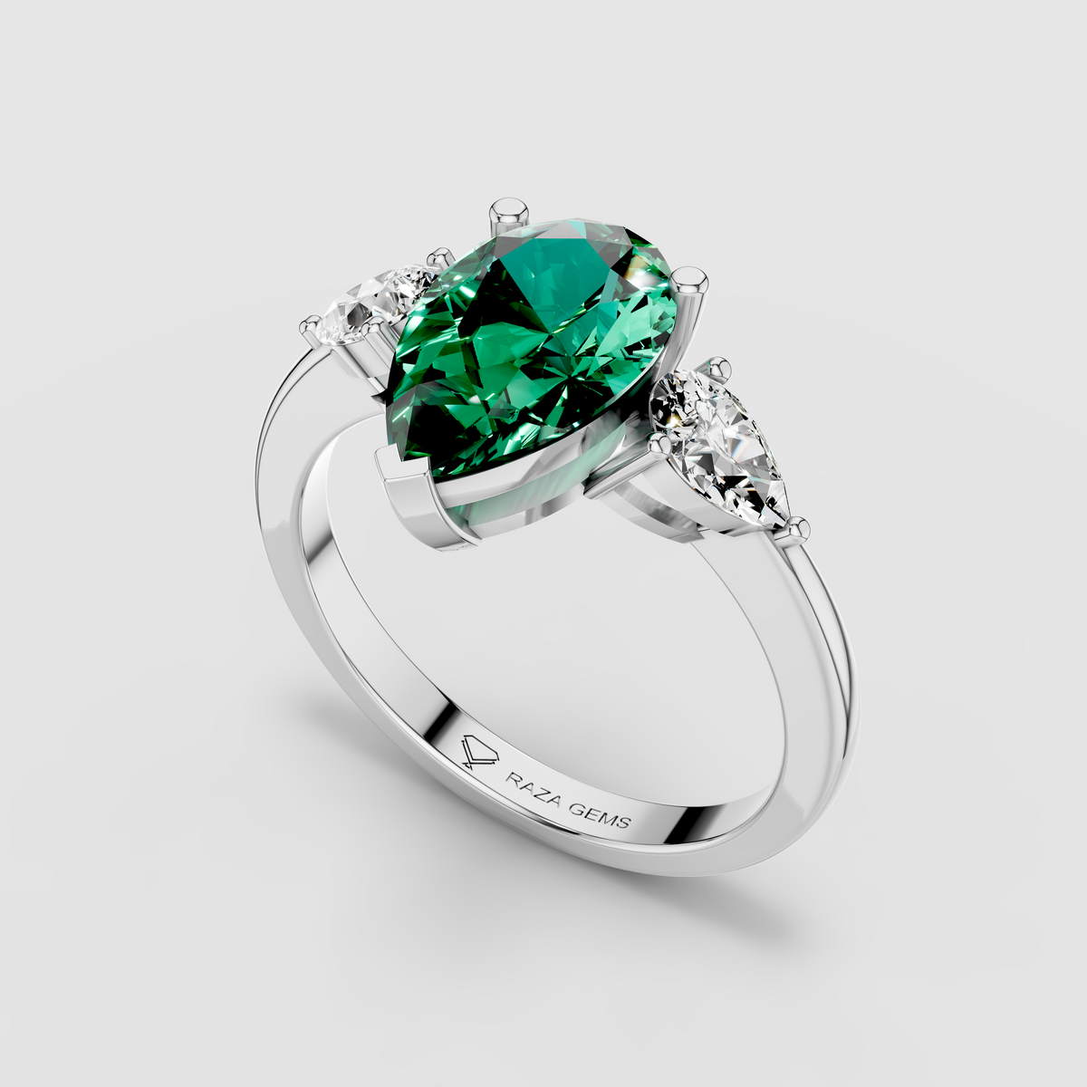 Sophia - Solid 18K Gold Pear Emerald with Pear Moissanite Side Stones
