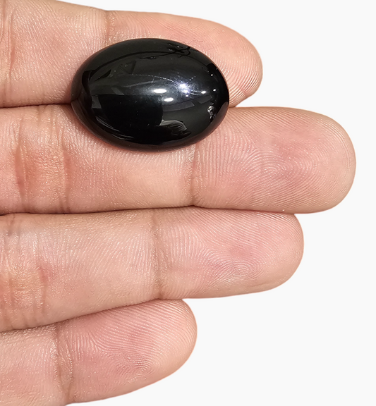 Natural Black Onyx Stone 23.33 Carats Oval Cabochon Size 25X10.6mm