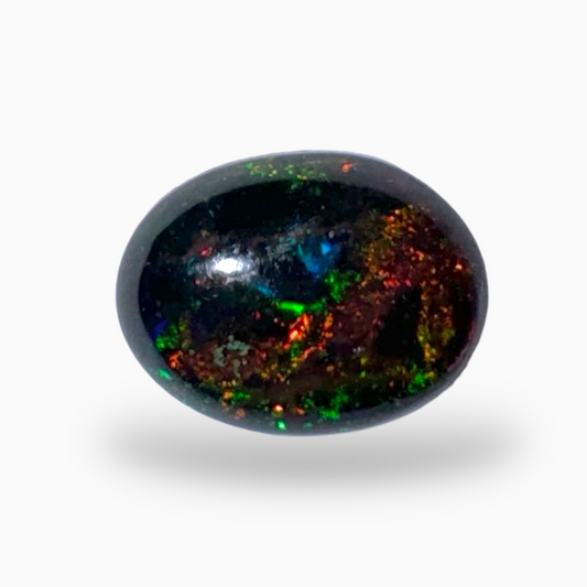 Natural Black Ethiopian Opal Stone 0.76 Carats Round Cabochon Shape Size 9X7mm