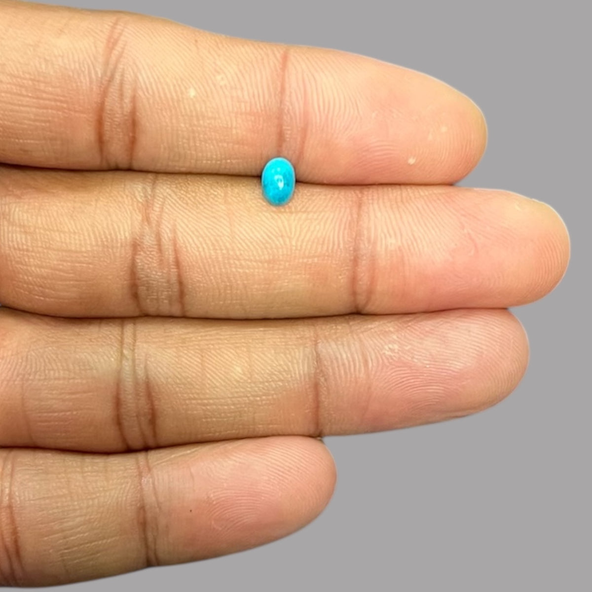 Blue Turquoise Stone 0.42 Carats 6 x 4.1 x 2.3 mm in oval