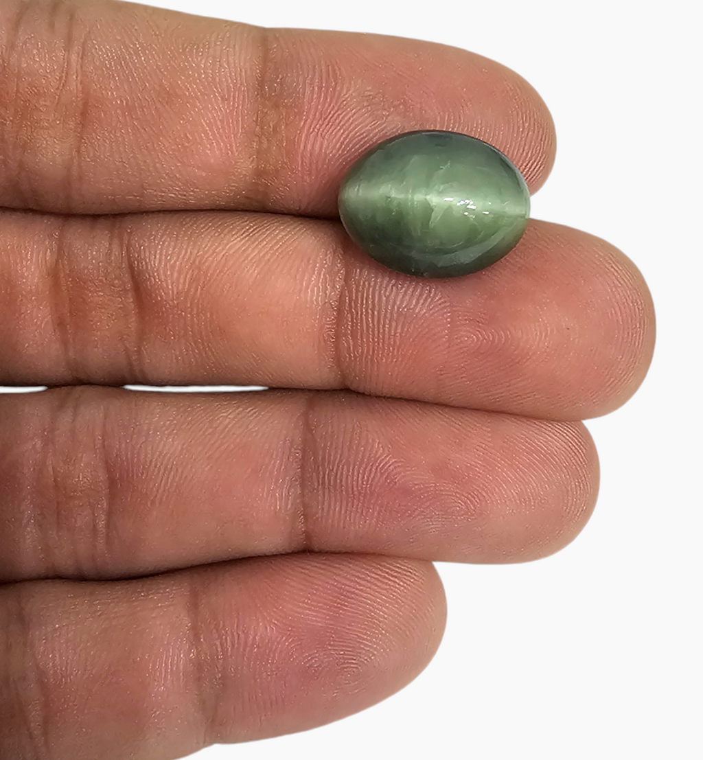Cats Eye Stone Natural 12.34 Carats Oval Cabochon Size 16X12.5mm