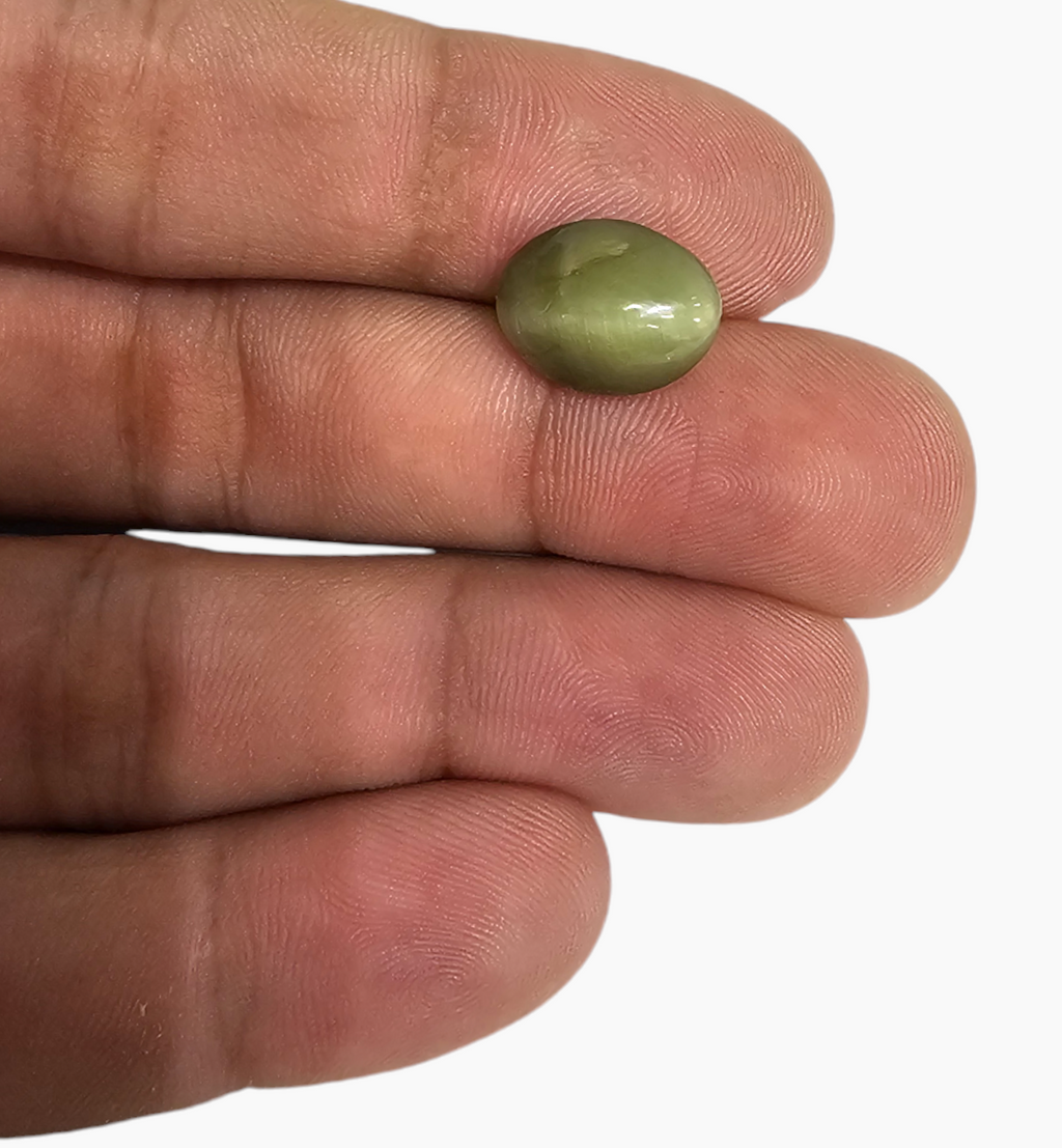 Cats Eye Stone Natural 7.01 Carats Oval Cabochon Size 13.8X10.7mm