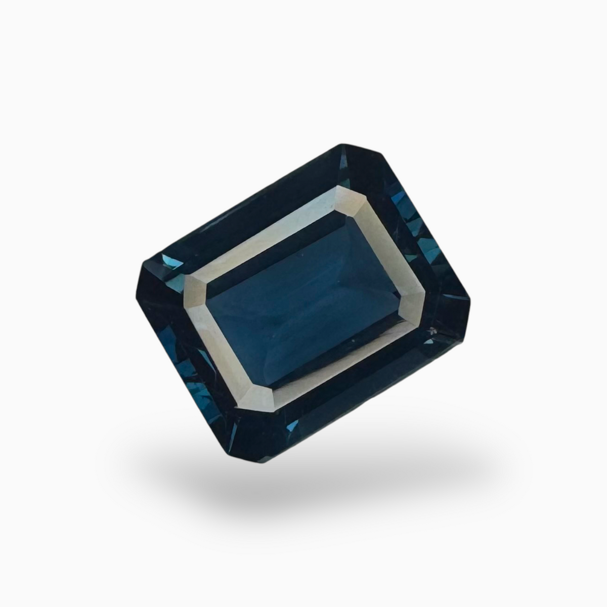 Londo Blue Topaz Emerald Cut 6.10 Carat 12x10mm