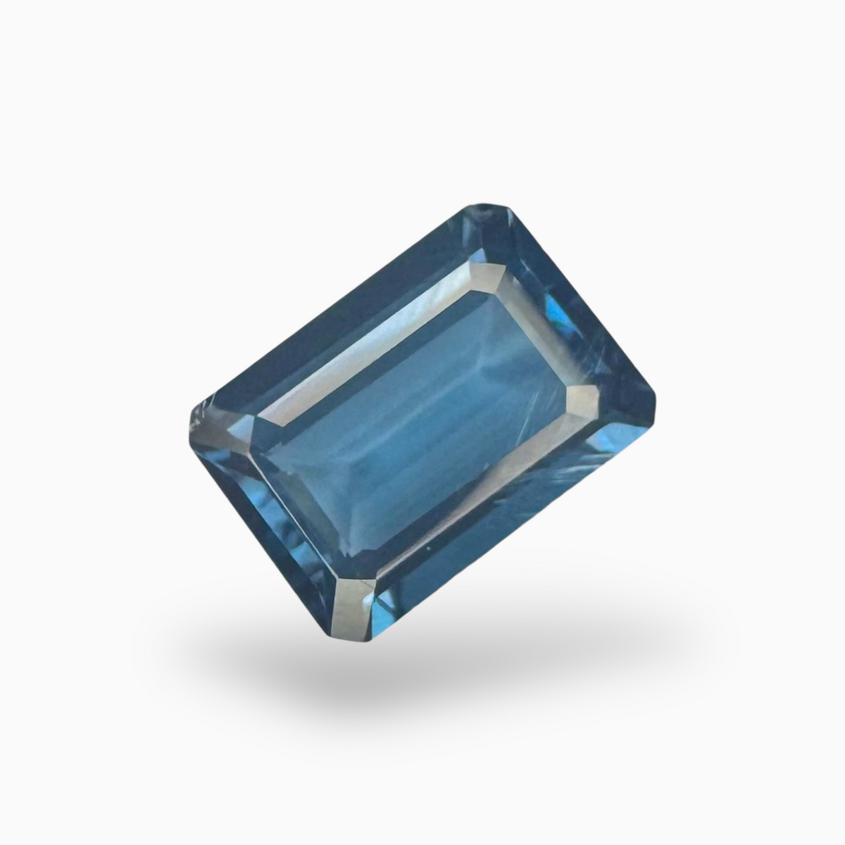London Blue Topaz Dark Steel Blue Color 7.58 Carats Emerald Cut Shape Size 14X10mm