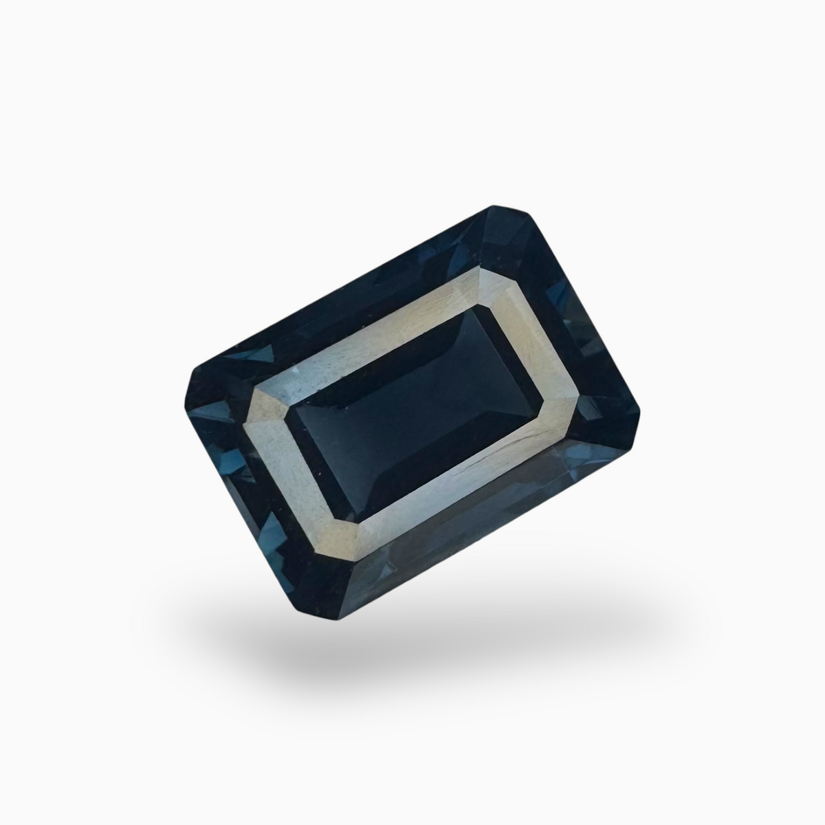 London Blue Topaz Emerald Cut 7.75 Carat 12.5x9mm