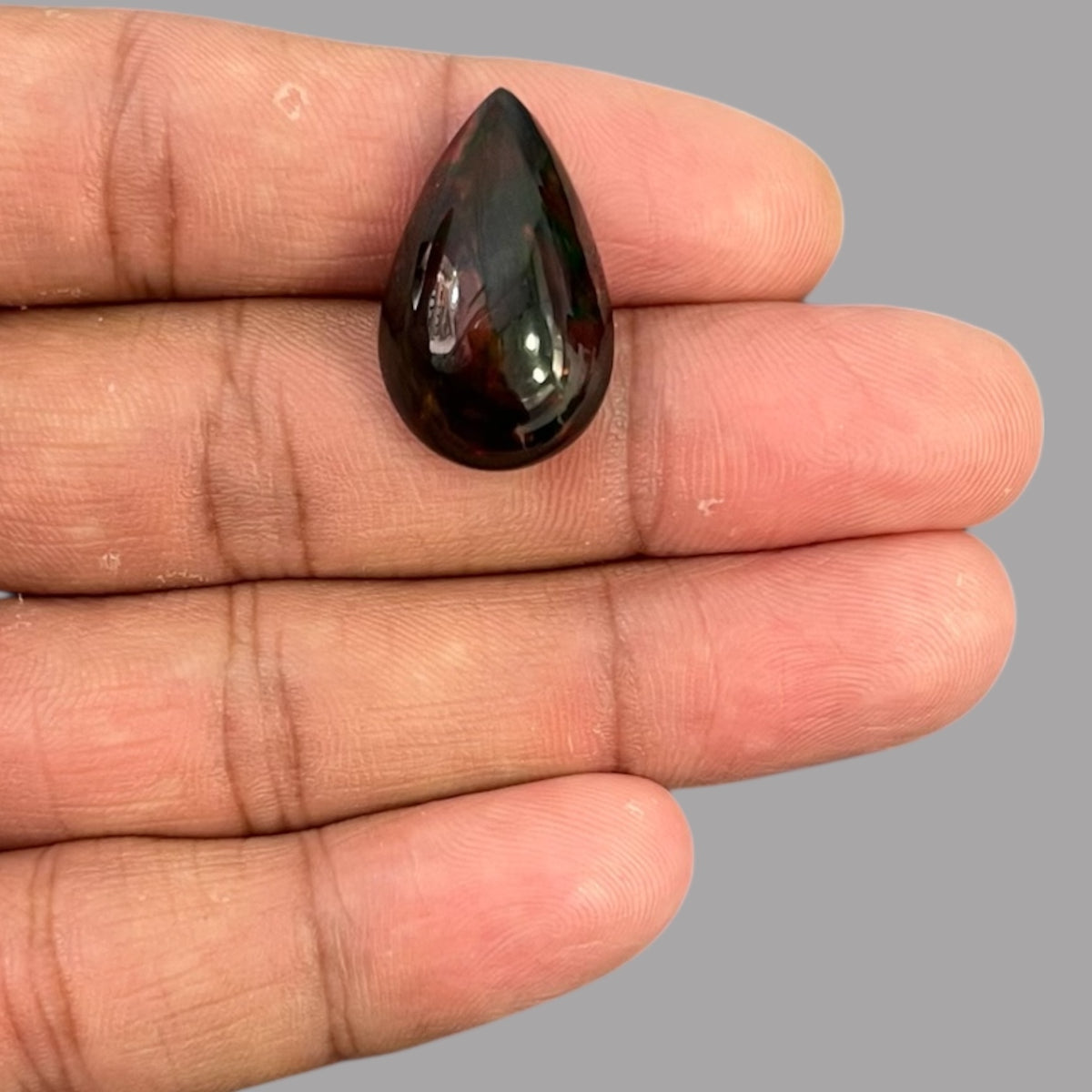 Natural Black Ethiopian Opal Stone 11.24 Carats Pear Cabochon Shape Size 25.2 x 15.4 x 8.2 mm