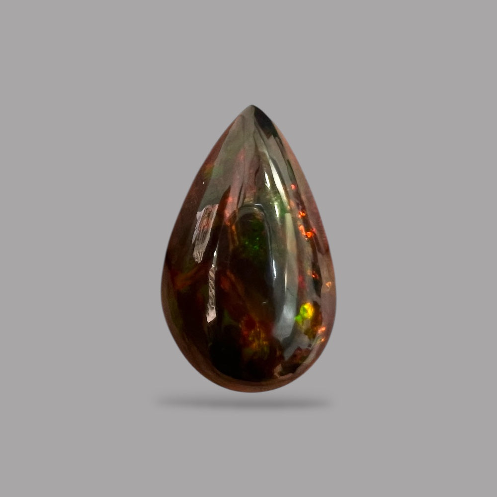 Natural Black Ethiopian Opal Stone 11.24 Carats Pear Cabochon Shape Size 25.2 x 15.4 x 8.2 mm