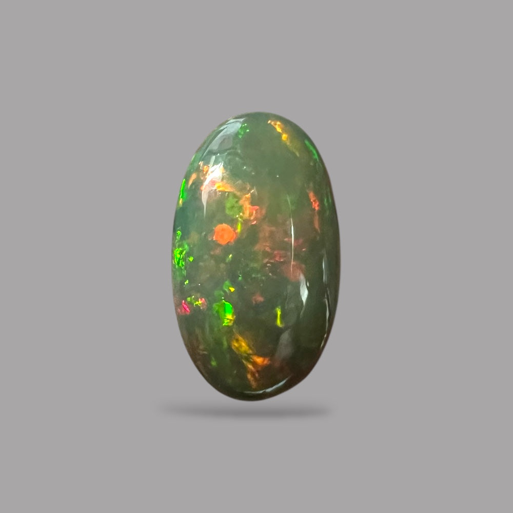 Natural Black Ethiopian Opal Stone 12.71 Carats Oval Cabochon Shape Size 24.5 x 14.4 x 6.9 mm