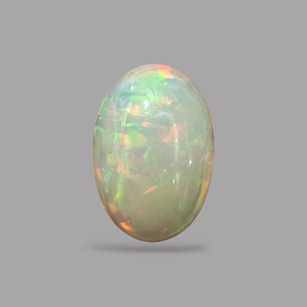 Natural Black Ethiopian Opal Stone 14.82 Carats Oval Cabochon Shape Size 23.3 x 15.8 x 9.2 mm