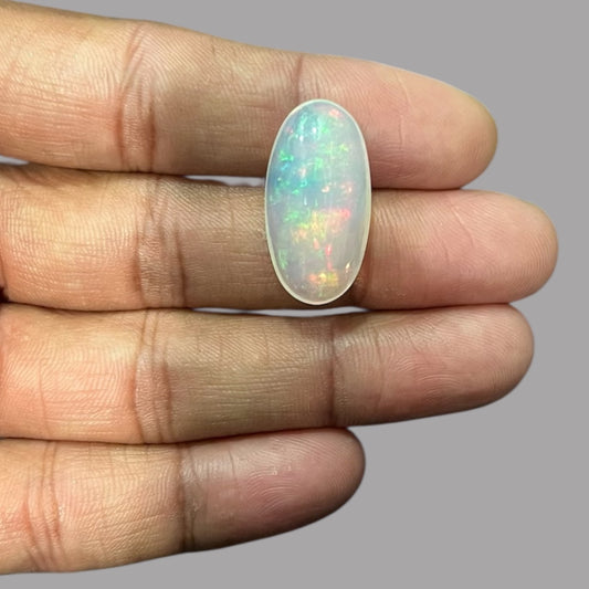 Natural Black Ethiopian Opal Stone 15.41 Carats Oval Cabochon Shape Size 25.8 x 13.5 x 9 mm