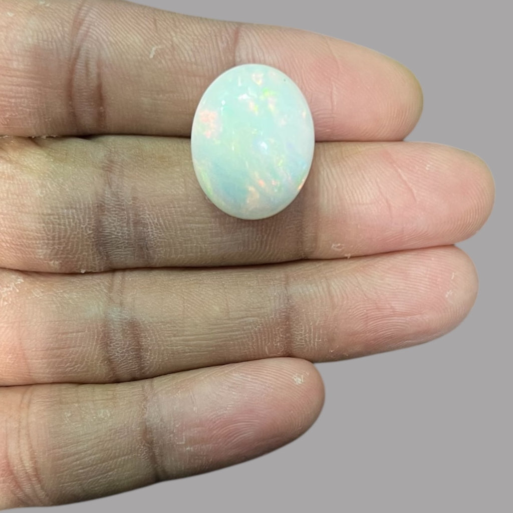 Natural Black Ethiopian Opal Stone 16.27 Carats Oval Cabochon Shape Size 20.2 x 16.2 x 9.9 mm