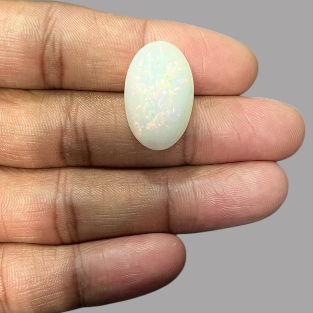 Natural Black Ethiopian Opal Stone 18.49 Carats Oval Cabochon Shape Size 23.7 x 15.1 x 11.5 mm