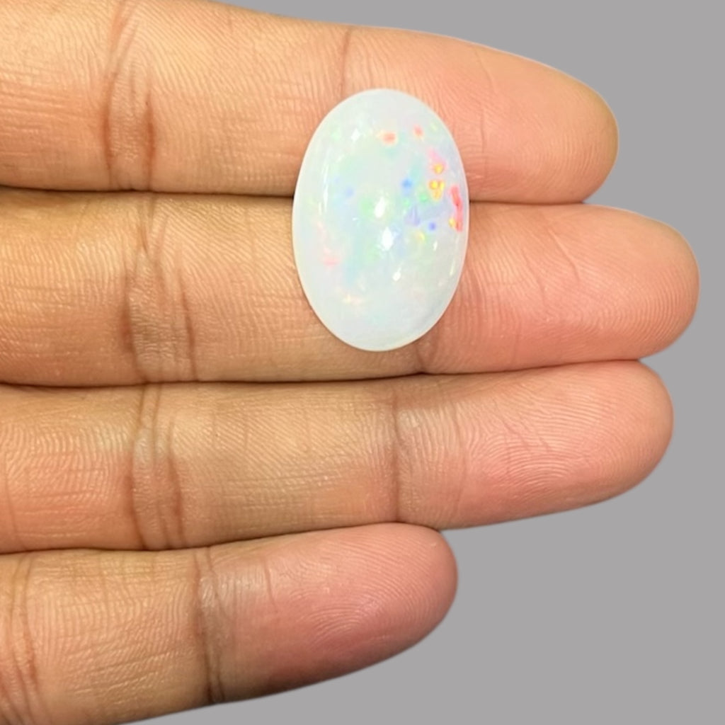 Natural Black Ethiopian Opal Stone 19.19 Carats Oval Cabochon Shape Size 24.4 x 16.6 x 8.1 mm