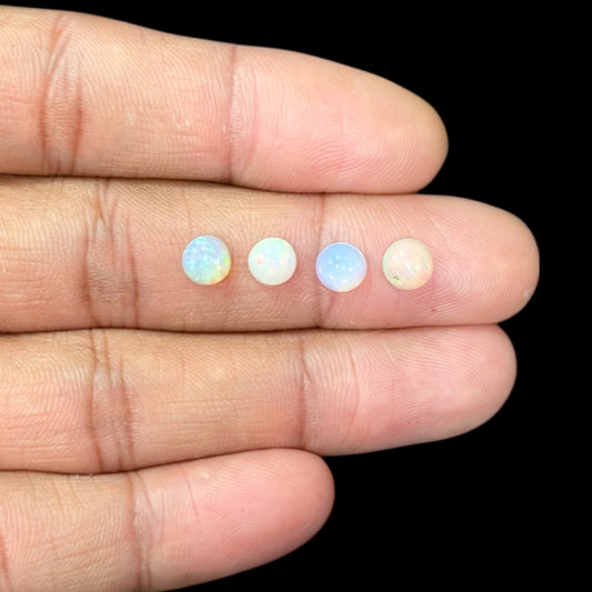 Natural White Ethiopian Opal Stone 20.51 Carats Round Cabochon Shape Size 6 mm