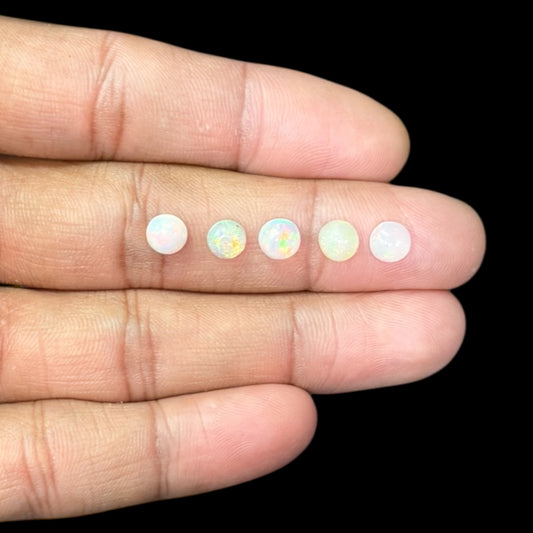 Natural White Ethiopian Opal Stone 21.58 Carats Round Cabochon Shape Size 6 mm